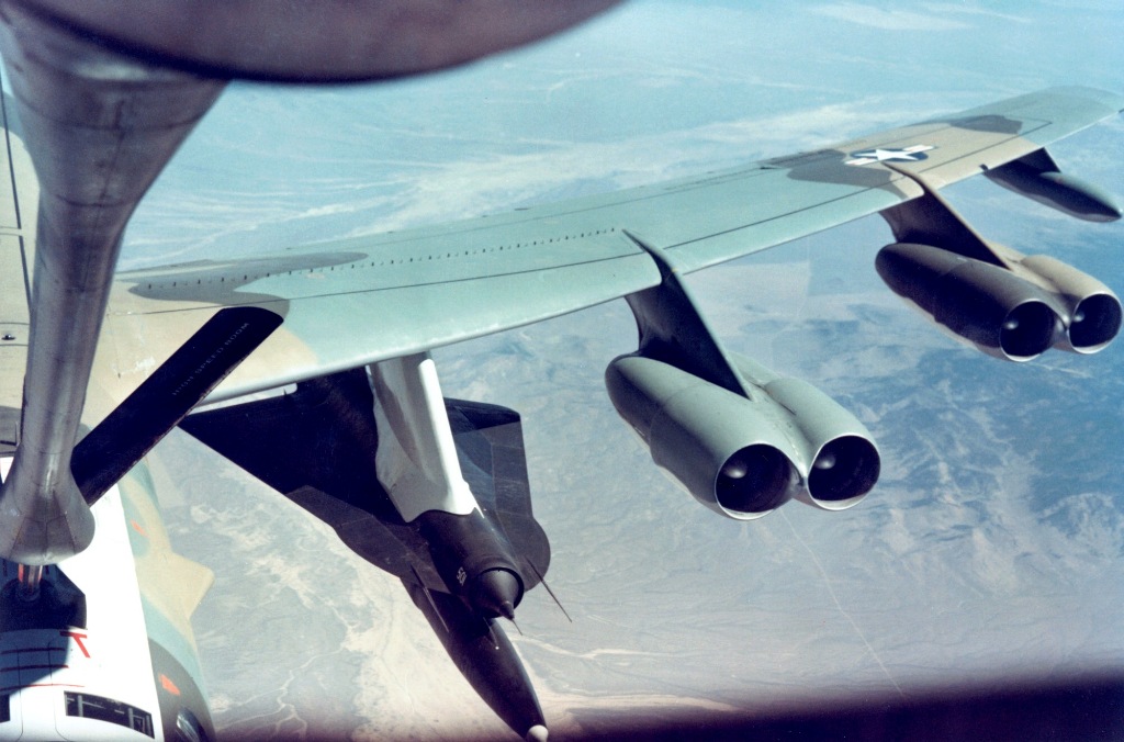 A B-52 carrying a D-21 reconnaissance drone and rocket booster.